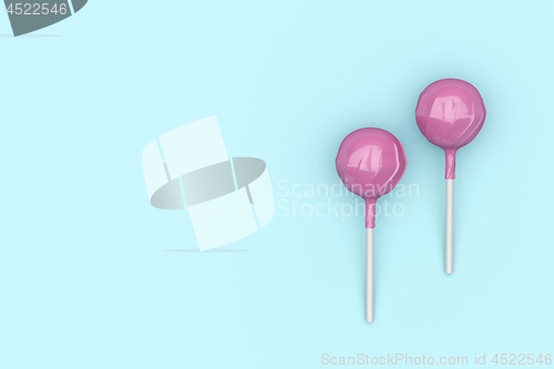 Image of Two pink lollipops