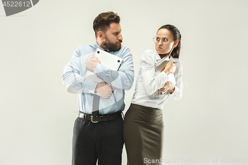 Image of Angry boss. Woman and secretary standing at office or studio