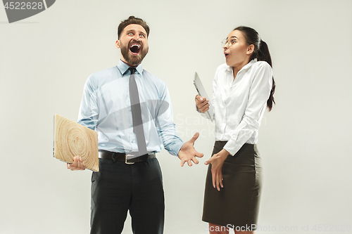 Image of Winning success woman and man happy ecstatic celebrating being a winner.