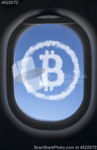 Image of Icon bitcoin made from clouds against the blue sky