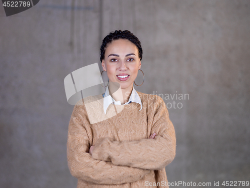 Image of portrait of young female architect on construction site