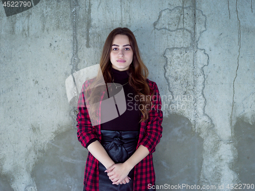 Image of portrait of young female architect on construction site