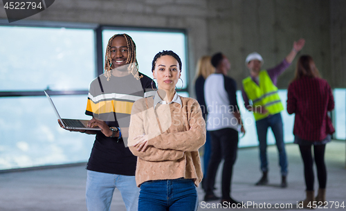 Image of multiethnic business people in group, architect and engineer on 