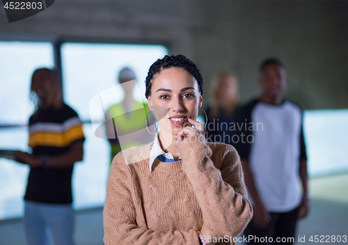 Image of young businesswoman on construction site