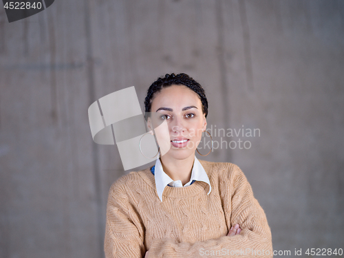 Image of portrait of young female architect on construction site