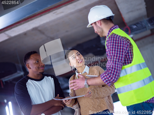 Image of multiethnic business people,architect and engineer on constructi