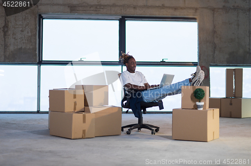 Image of young black male architect on construction site