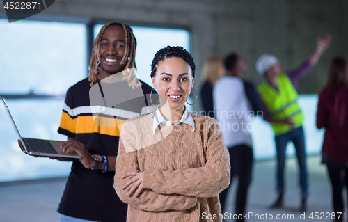 Image of multiethnic business people in group, architect and engineer on 