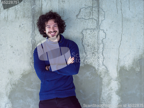 Image of portrait of young male architect on construction site