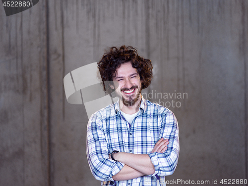 Image of portrait of young male architect on construction site