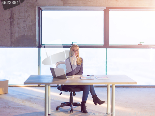 Image of young female architect on construction site