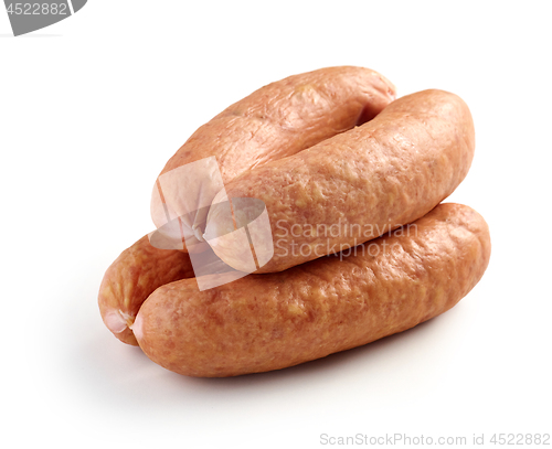 Image of smoked sausages on white background