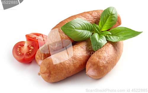 Image of smoked sausages on white background