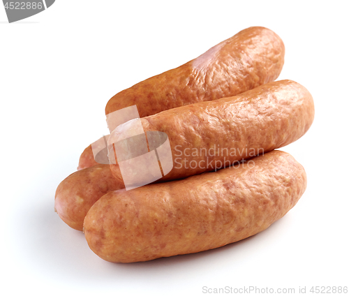 Image of smoked sausages on white background