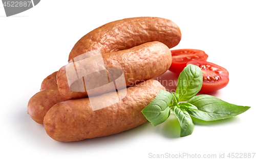 Image of smoked sausages on white background