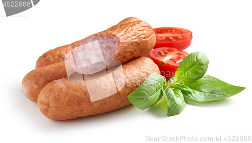 Image of smoked sausages on white background