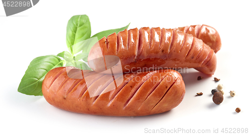 Image of grilled sausages on white background