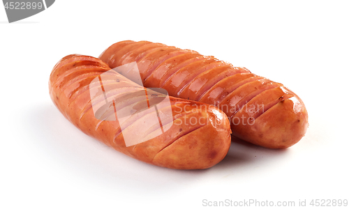 Image of grilled sausages on white background