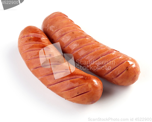 Image of grilled sausages on white background