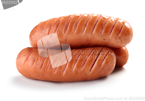 Image of grilled sausages on white background