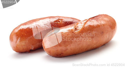 Image of grilled sausages on white background