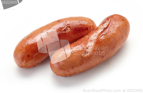 Image of grilled sausages on white background