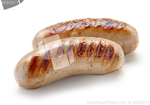 Image of grilled sausages on white background