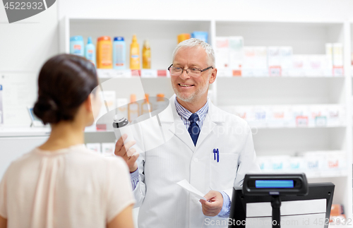 Image of apothecary with cure and customer at pharmacy