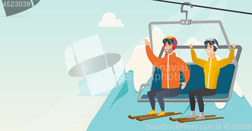 Image of Two caucasian skiers using cableway at ski resort.