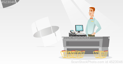 Image of Cashier standing at the checkout in a supermarket.
