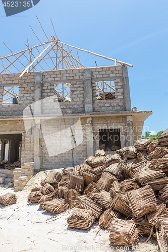 Image of Construction site of traditional roof thatching in Africa. Developing of traditional tached roof civil engineering