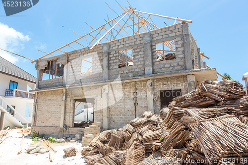 Image of Construction site of traditional roof thatching in Africa. Developing of traditional tached roof civil engineering