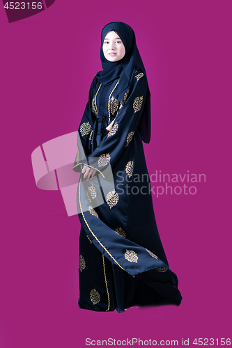 Image of muslum woman with hijab in modern dress