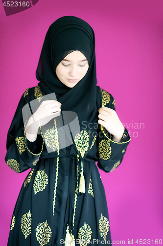 Image of muslum woman with hijab in modern dress