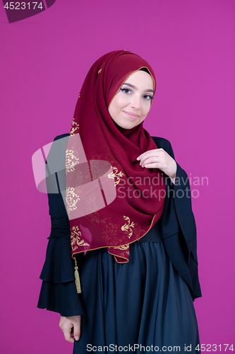 Image of muslum woman with hijab in modern dress