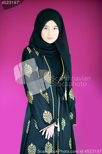 Image of muslum woman with hijab in modern dress