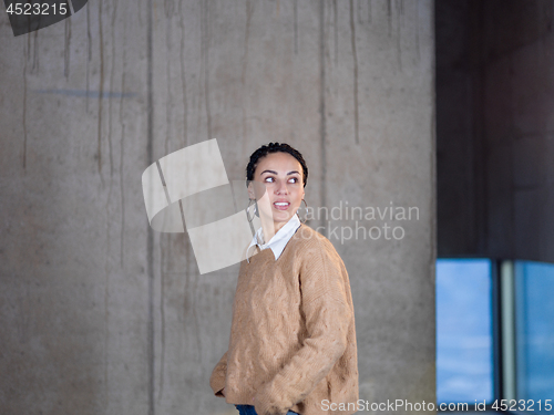 Image of portrait of young female architect on construction site