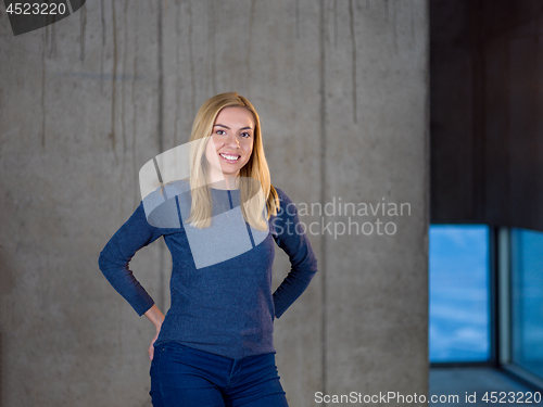 Image of portrait of young female architect on construction site