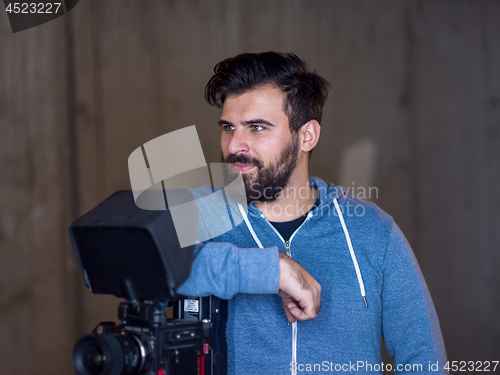 Image of portrait of videographer at work