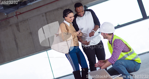 Image of multiethnic business people in group, architect and engineer on 