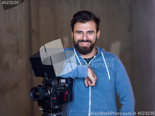 Image of portrait of videographer at work