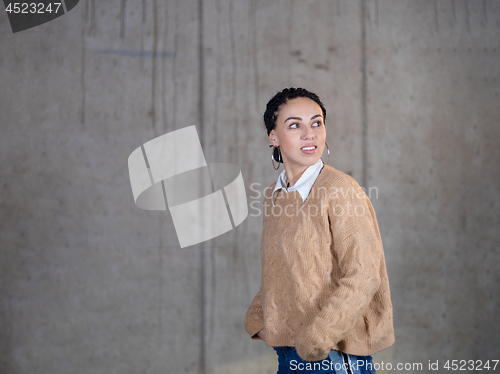 Image of portrait of young female architect on construction site