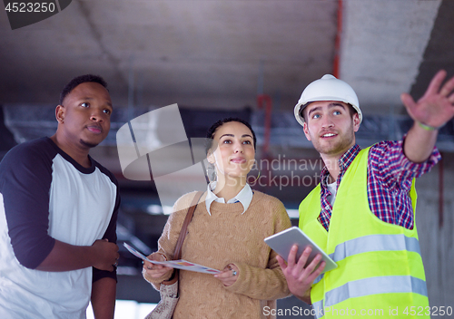 Image of multiethnic business people,architect and engineer on constructi