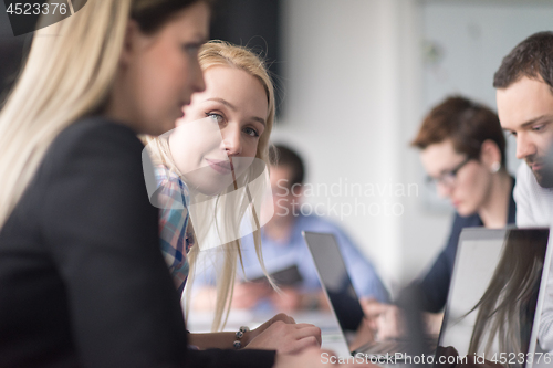 Image of Business Team At A Meeting at modern office building