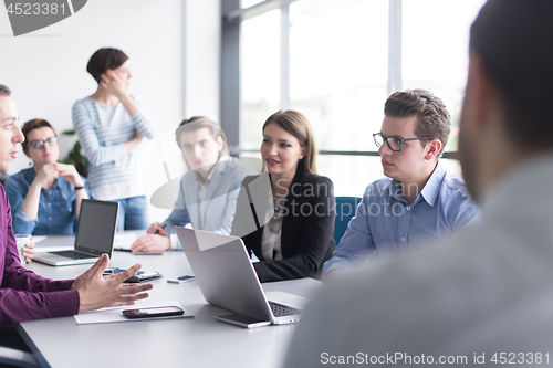 Image of Business Team At A Meeting at modern office building