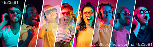 Image of Beautiful young people in neon light isolated on multicolored studio background