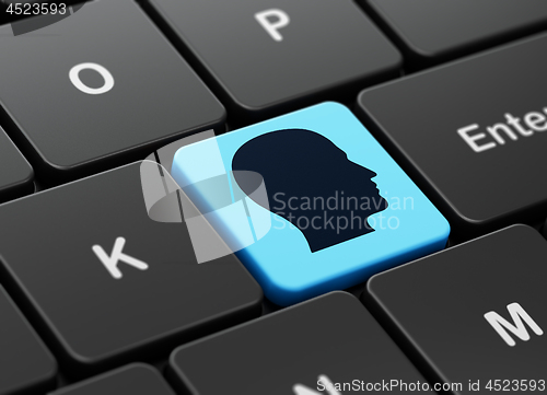 Image of Business concept: Head on computer keyboard background