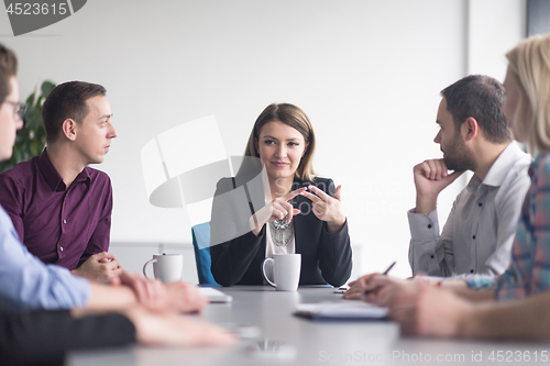 Image of Group of young people meeting in startup office