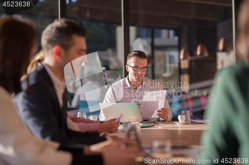 Image of Business Team At A Meeting at modern office building