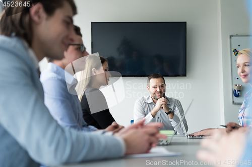 Image of Business Team At A Meeting at modern office building